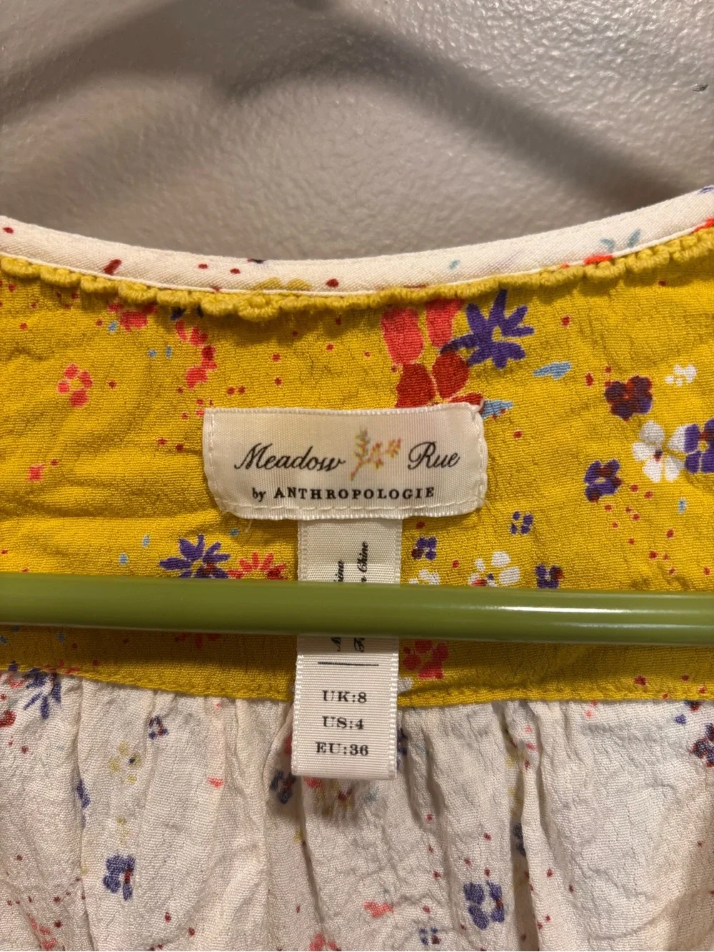 Anthropologie White Floral Wrap Top with Mustard Puff Sleeves